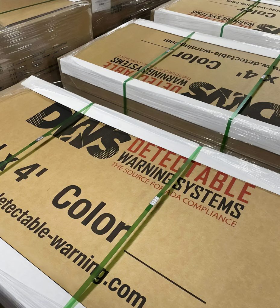 Flexible RediMat tactile surface rolled out for installation.