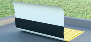 While standing on one side of the mat reach over and lift the opposite side. Then remove one section of the plastic/paper backing.