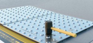 Imbed plates flush with the concrete by tapping with a rubber mallet until they are level with the surface of the concrete.
